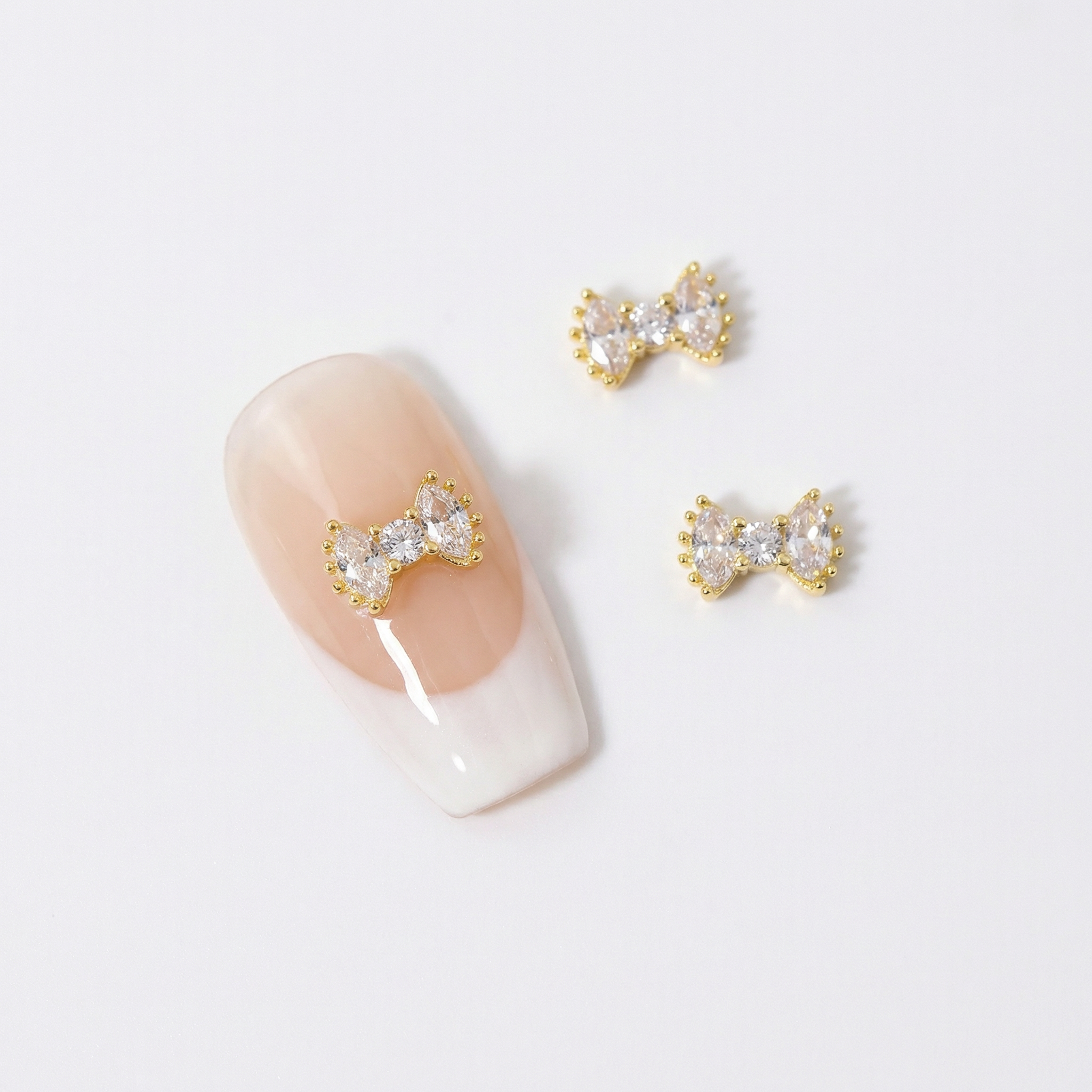 Par de dijes Mini Lazos cristal
