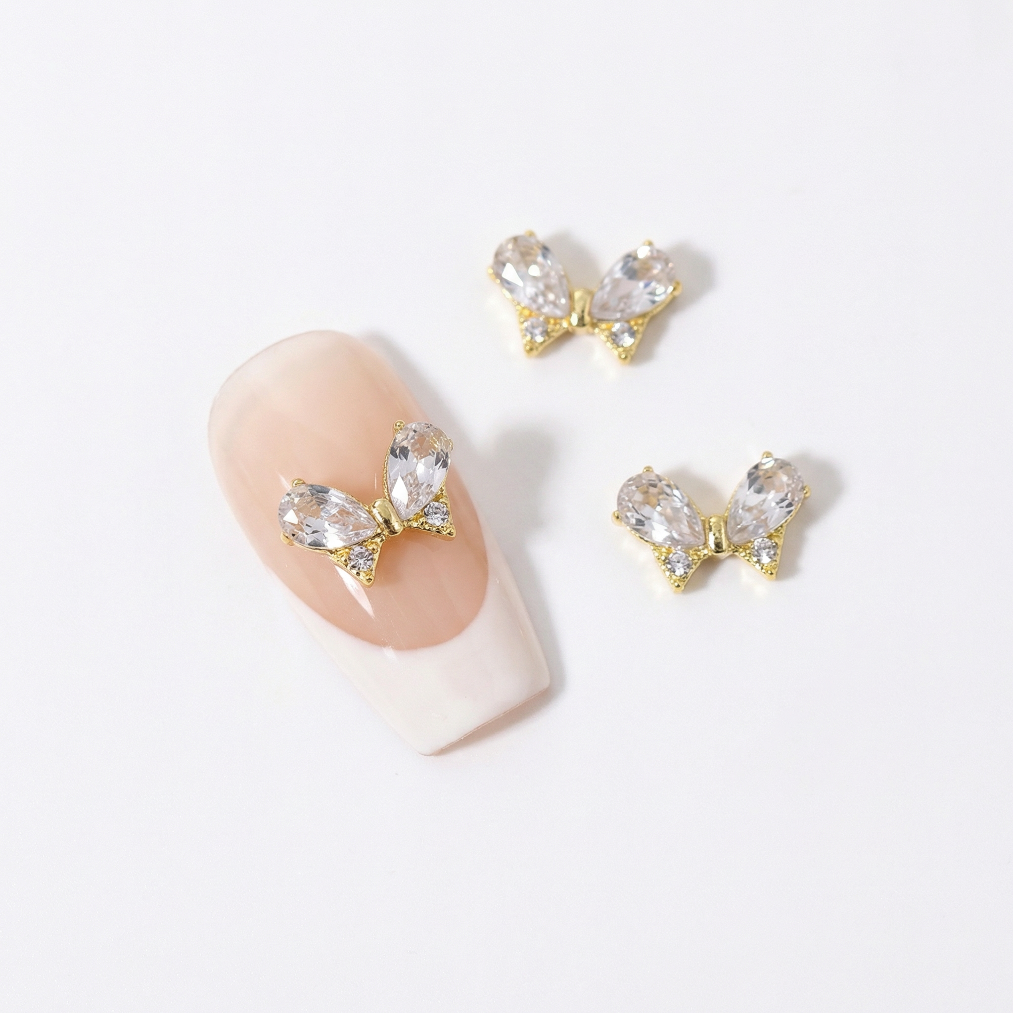 Paquete dijes mariposa dorada cristal